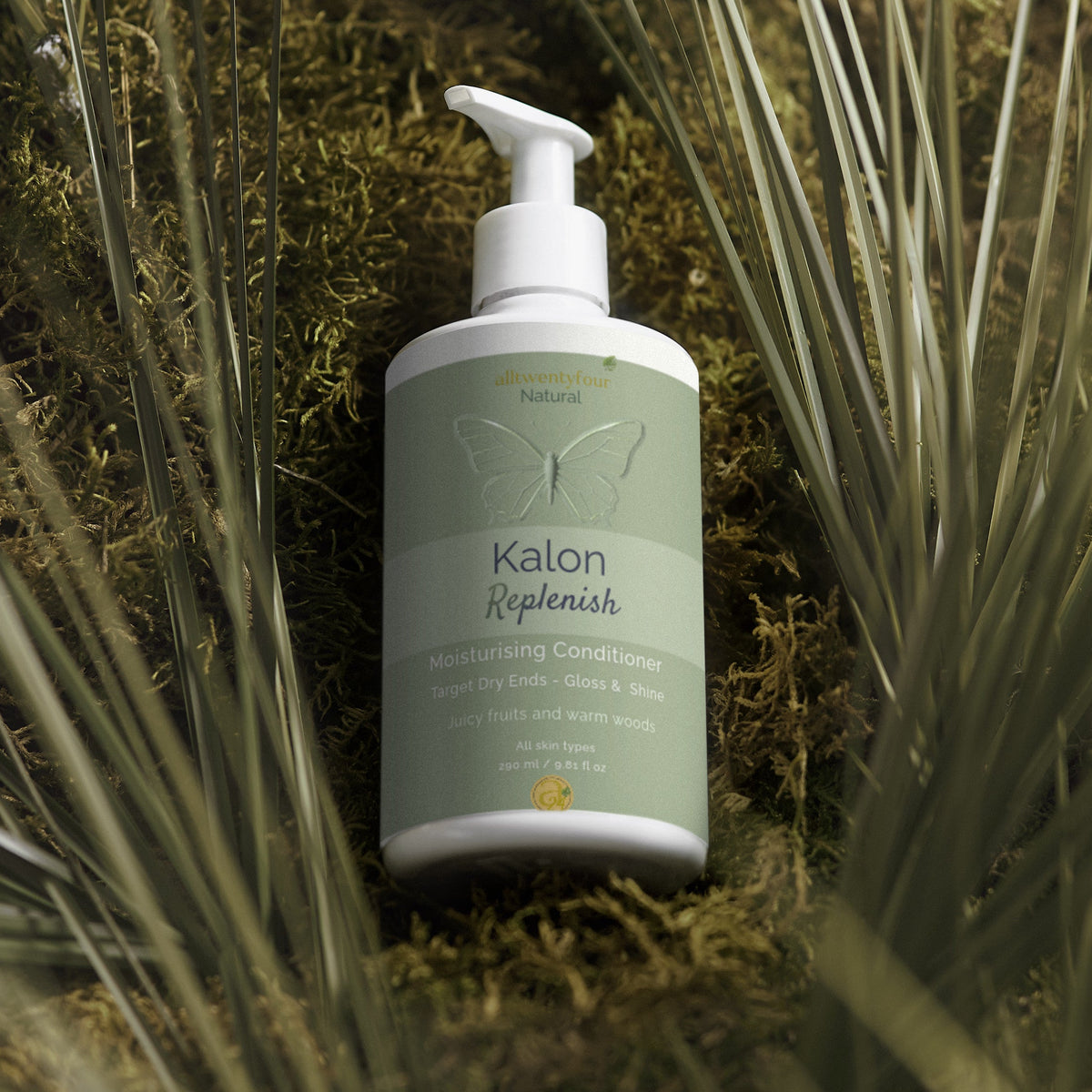 Kalon Beauty bottle on a natural background with plants