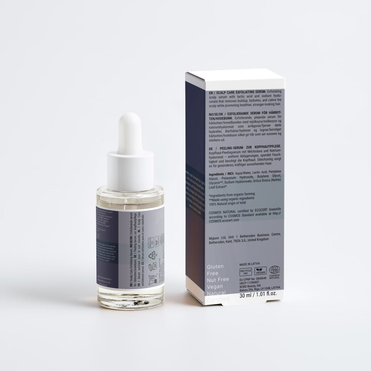 A clear glass Kalon scalp dropper bottle with a white dropper cap and a dark label, standing next to its matching product box on a clean white background.