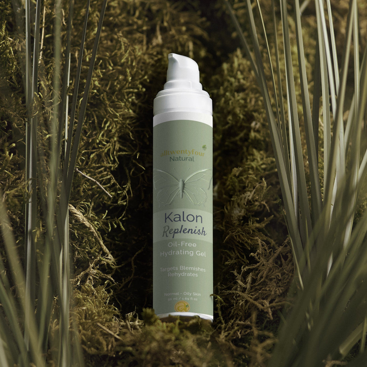 Kalon bottle on a natural background with grass and moss