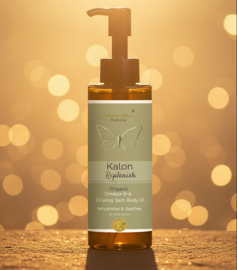 A pump bottle of Kalon Replenish Organic Omega 3+6 Glowing Skin Body Oil centered against golden hour