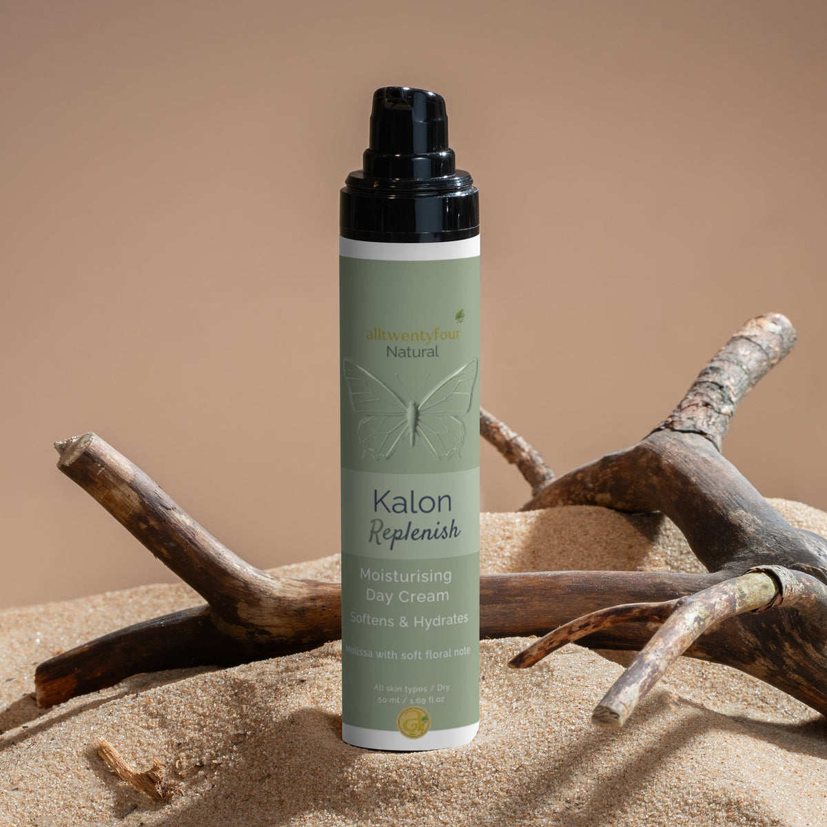 Kalon anti-age day cream bottle on sand with driftwood